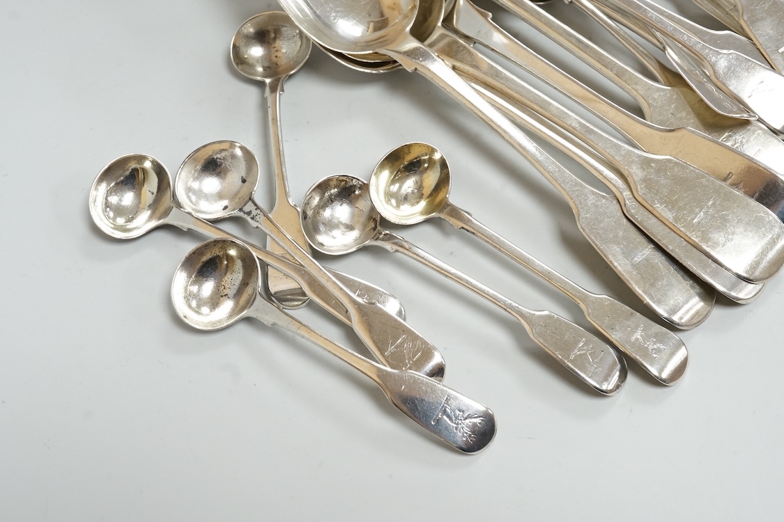 A harlequin part canteen of 19th century silver fiddle pattern flatware, comprising twenty six items, all with engraved crest various dates and makers, 32.3oz.